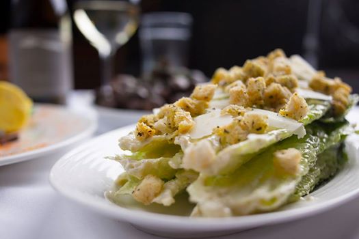 Order Caesar Salad food online from Kirby Prime Steakhouse store, The Woodlands on bringmethat.com