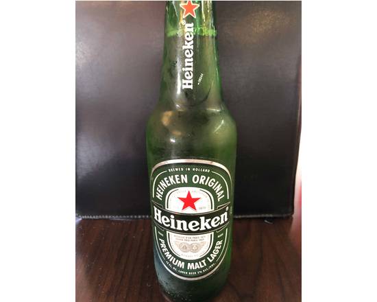 Order Heineken, 12oz bottled beer (5.0% ABV) food online from Langers Deli store, Los Angeles on bringmethat.com