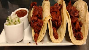 Order 95. Tacos al Pastor food online from La Tolteca store, Williamsburg on bringmethat.com