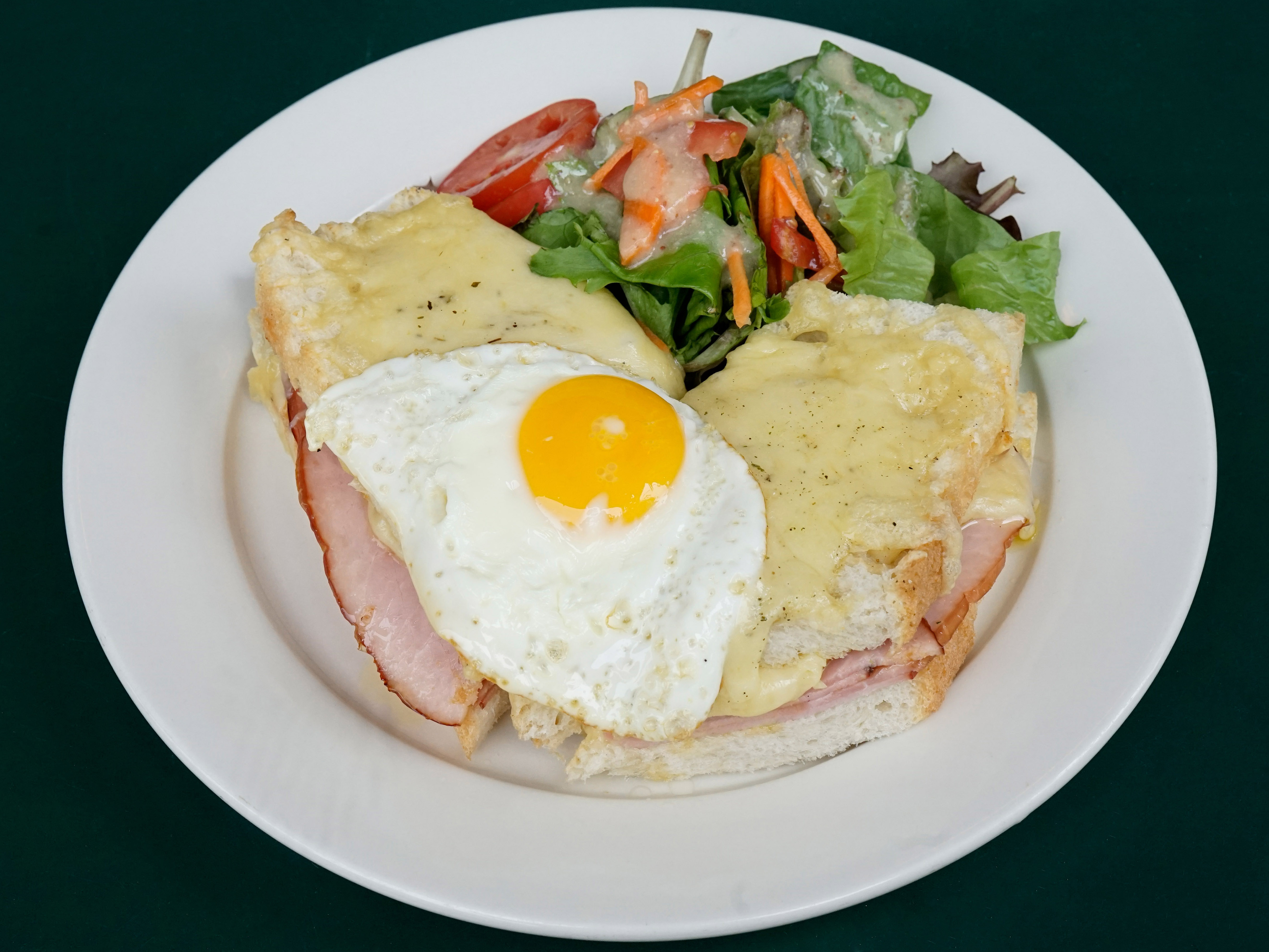 Order Croque Madame Sandwich food online from Le Grainne Cafe store, New York on bringmethat.com