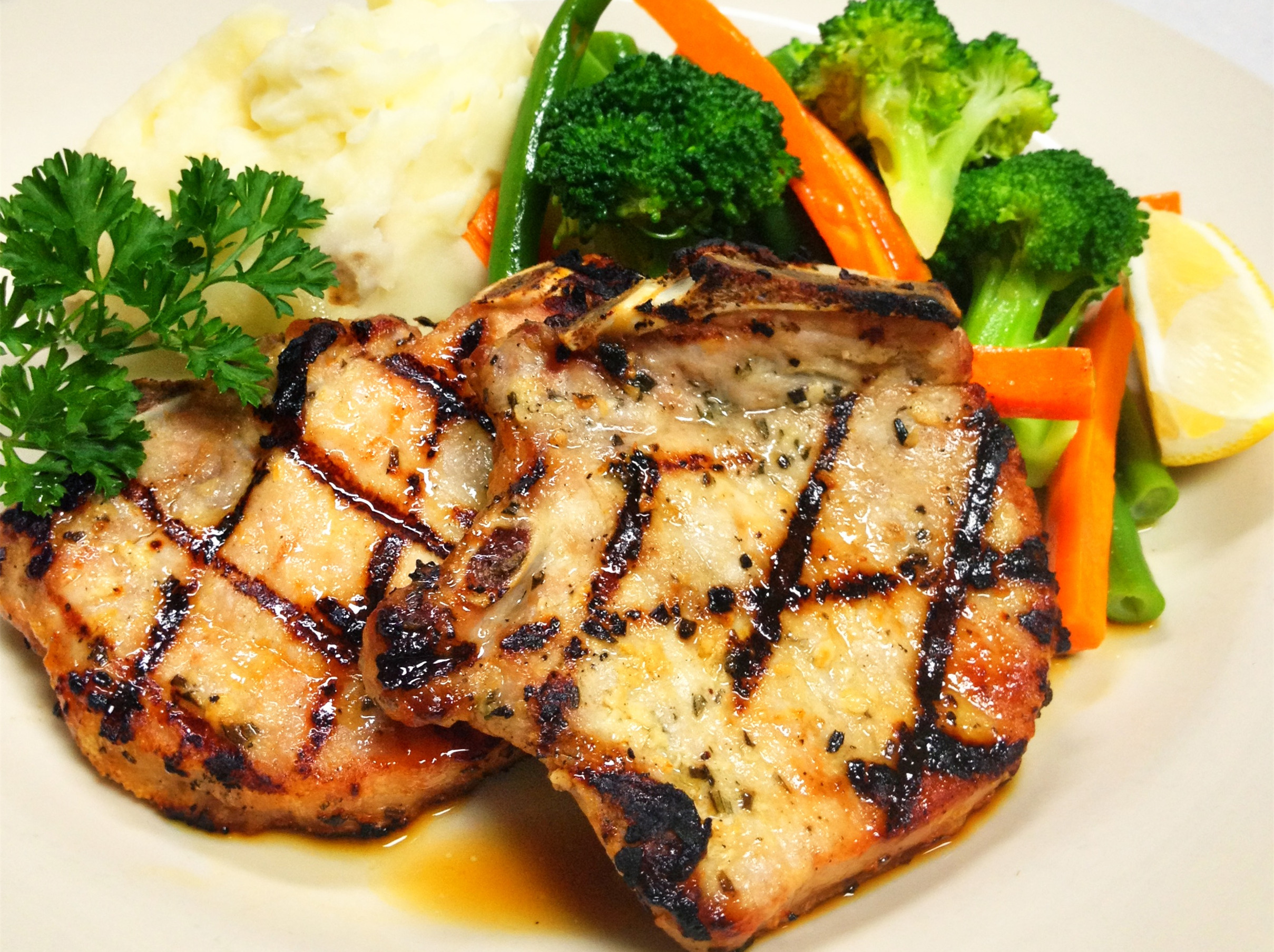 Order M4. Grilled Pork Chop food online from Pomodoro store, New York on bringmethat.com