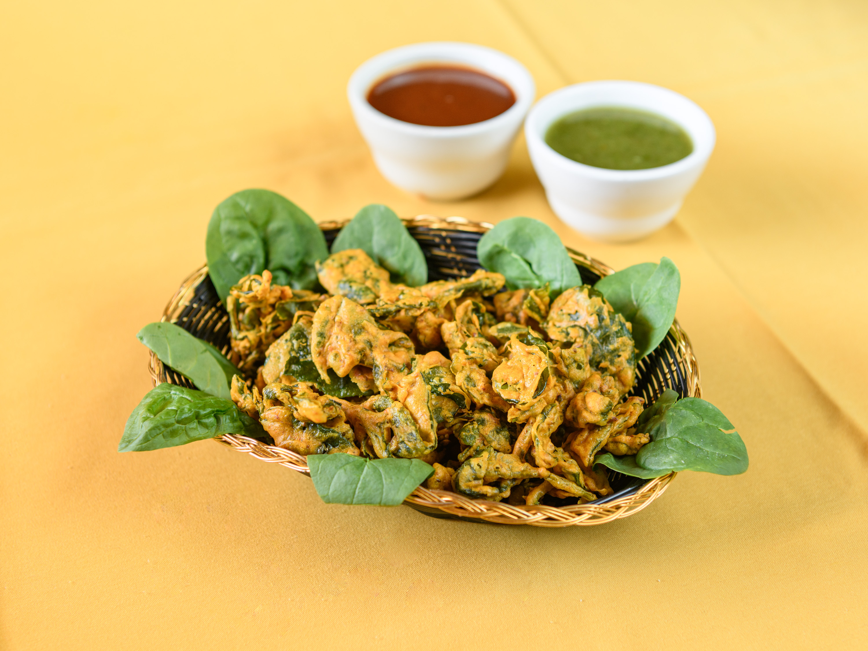 Order Spinach Pakoda food online from Taj Cuisine of India store, Oklahoma City on bringmethat.com
