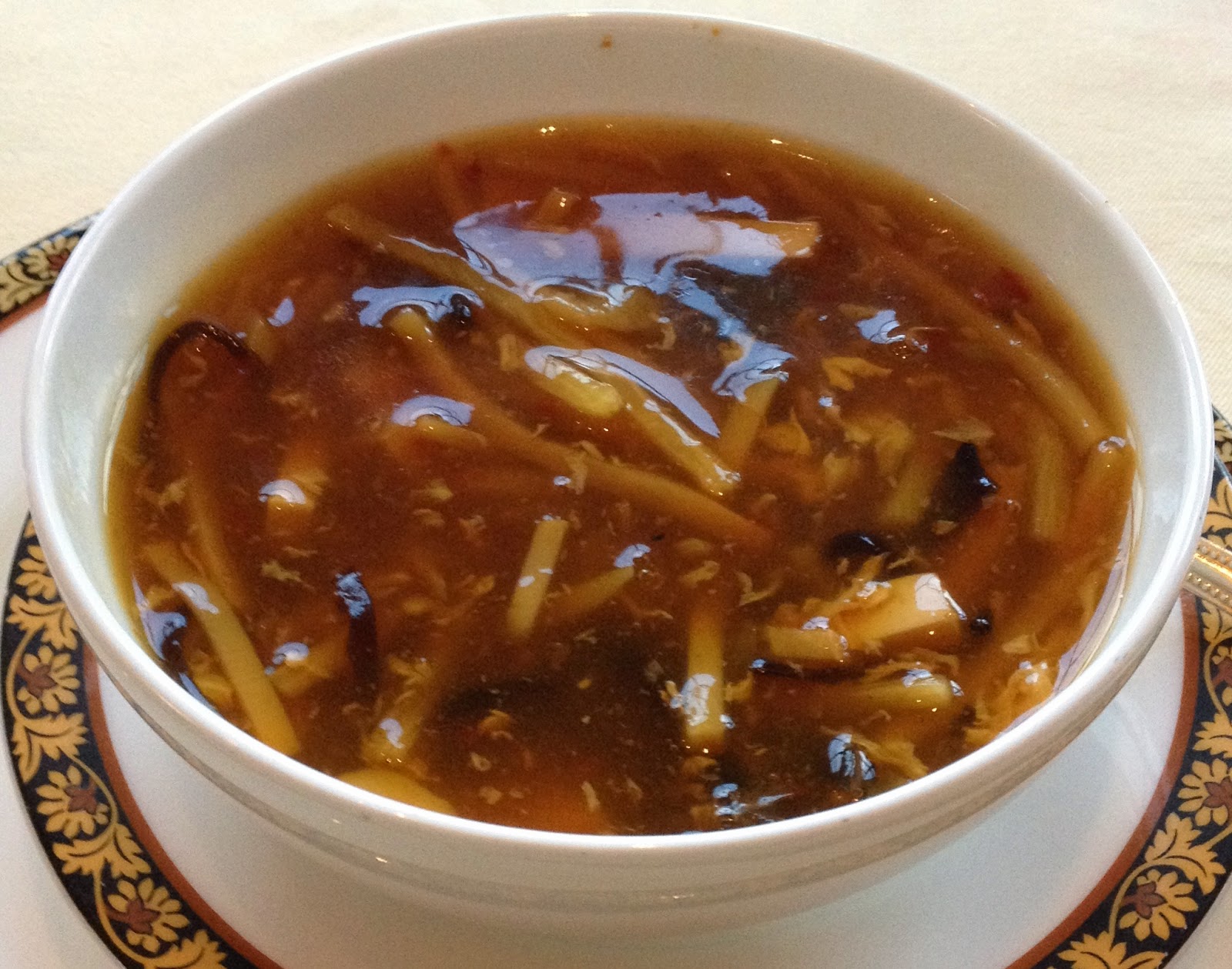 Order Hot and Sour Soup food online from Panda Mongolian BBQ store, Orange on bringmethat.com