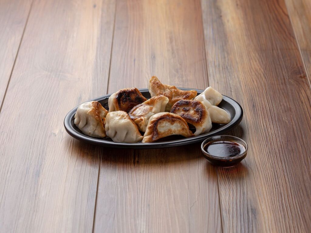 Order 11. Pork Dumplings food online from Everspring Chinese Restaurant store, Baltimore on bringmethat.com
