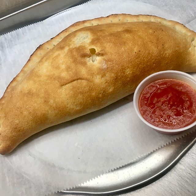 Order Ricotta and Mozzarella Cheese Calzone food online from Calabria Pizza store, Oradell on bringmethat.com
