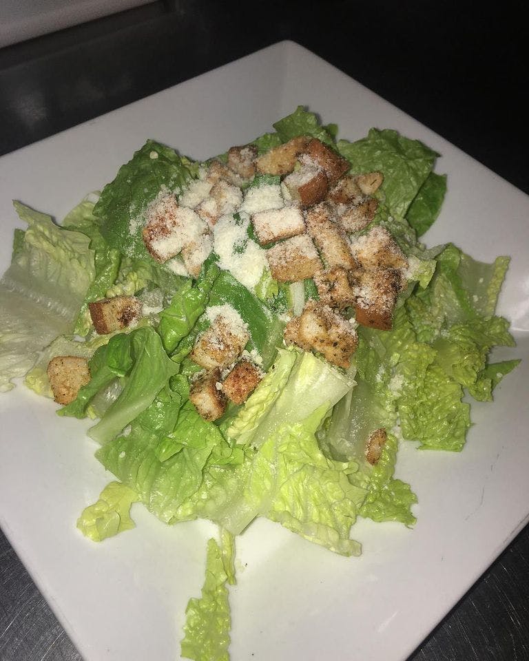 Order Caesar Salad - Salads food online from Amy's Family Pizzeria store, Hatboro on bringmethat.com