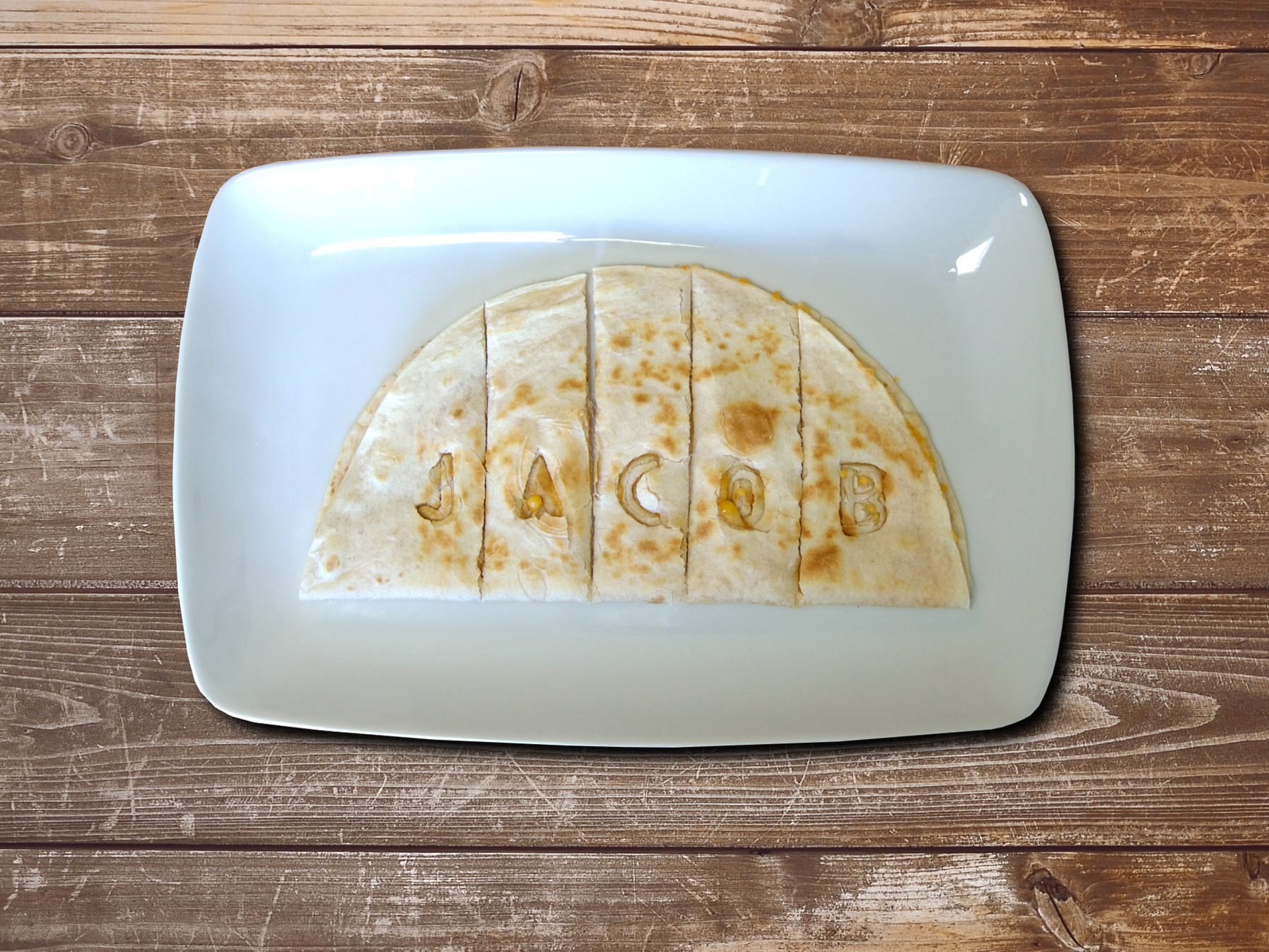 Order "Your Name" Quesadilla food online from Unique Bite Eatery store, Indio on bringmethat.com
