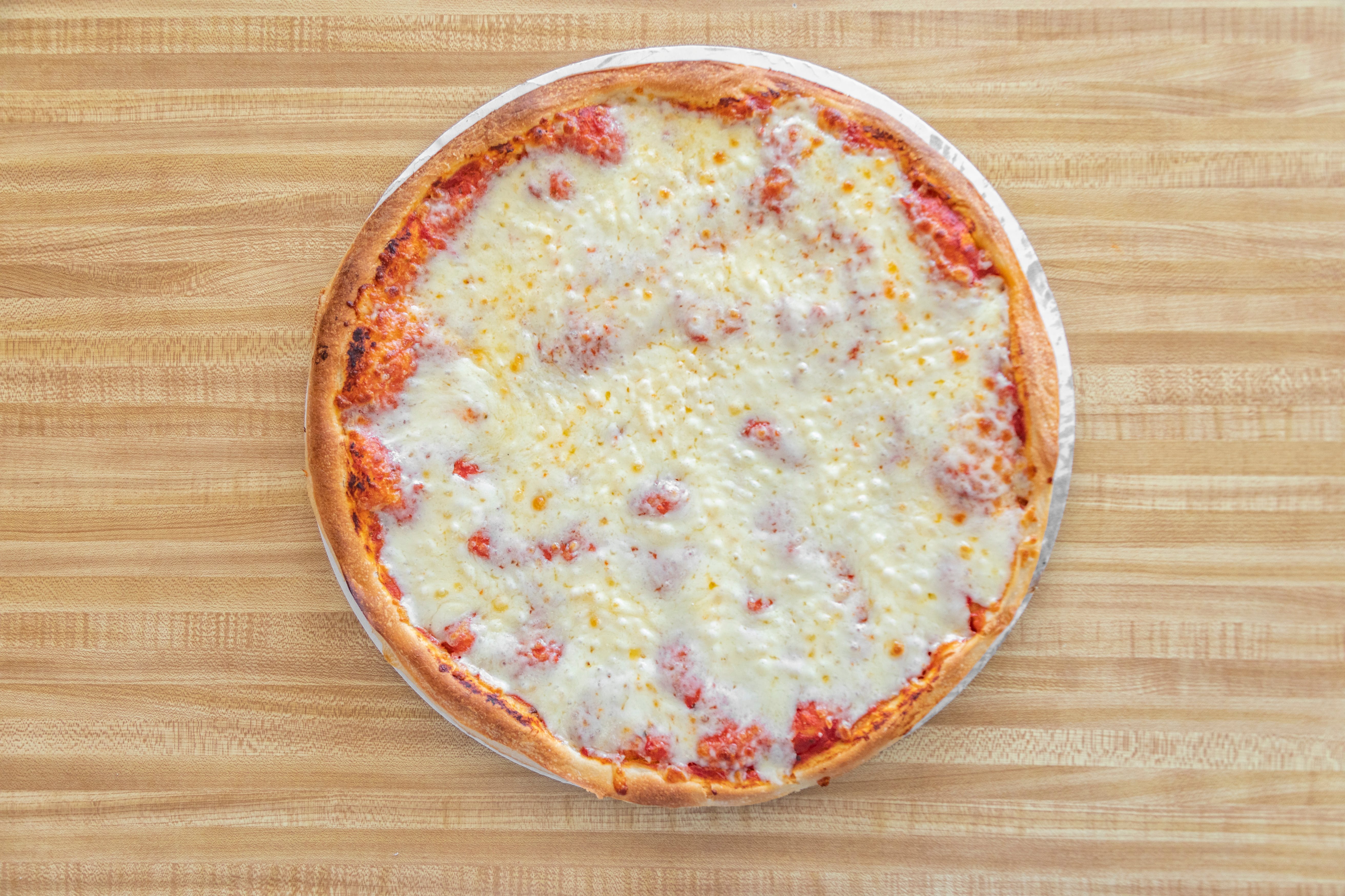 Order Plain Cheese Pizza Slice - Slice food online from Second Poquonock Giant Grinder store, Windsor Locks on bringmethat.com