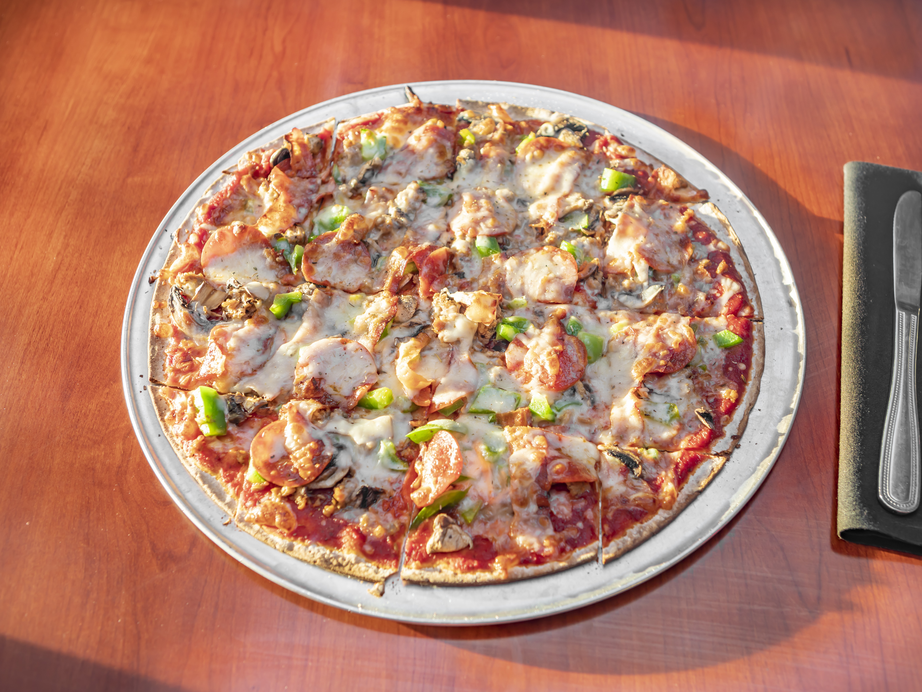 Order Deluxe Pizza food online from Firehouse Bar & Grill store, St. Louis on bringmethat.com