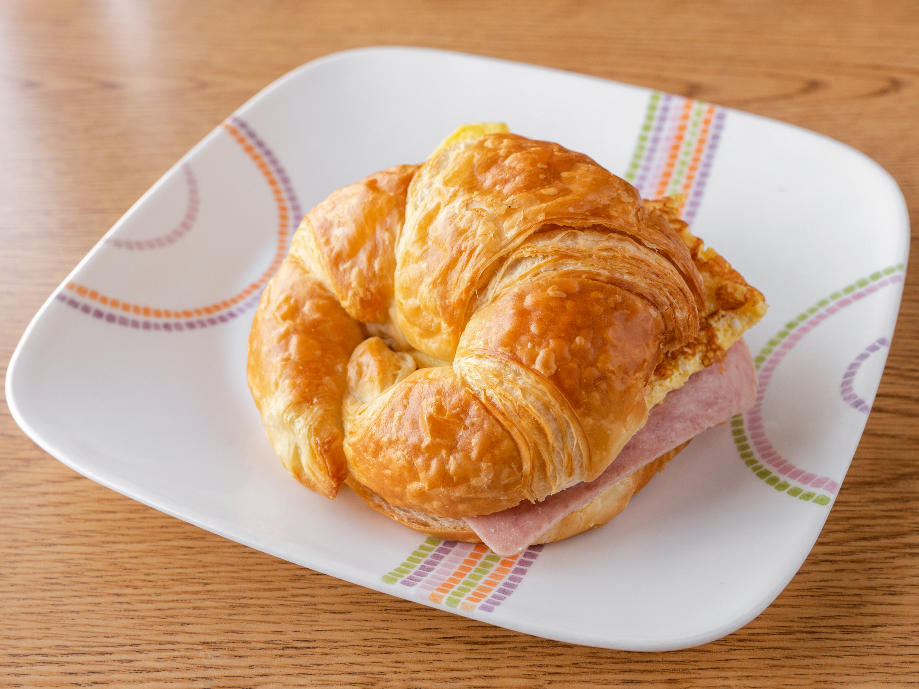 Order 4. Ham, Egg and Cheese Croissant food online from Glady Donuts store, Bellflower on bringmethat.com