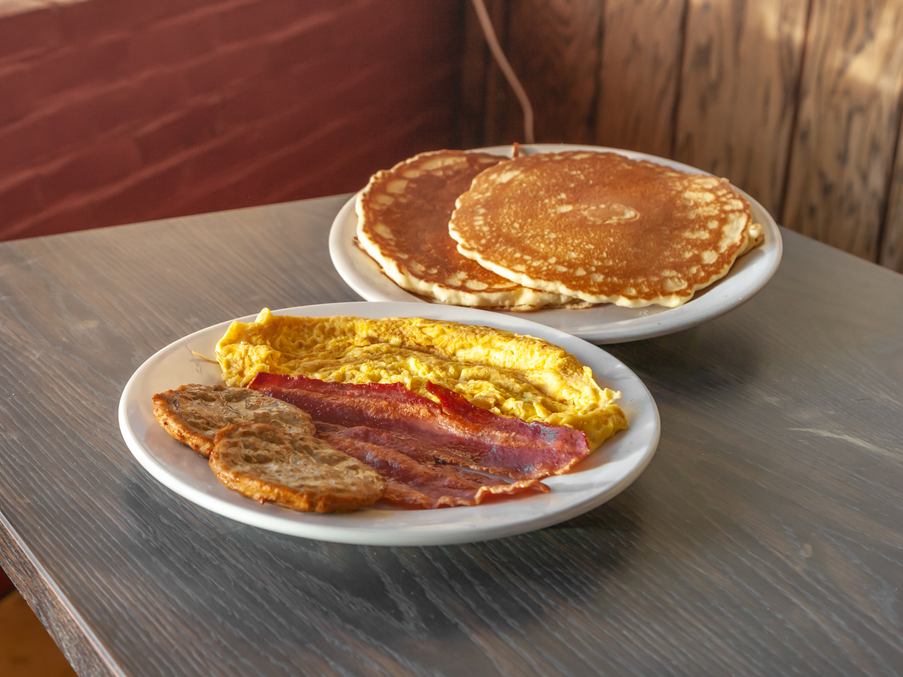 Order #16. Two Pancakes 2 Eggs with Turkey Bacon and Turkey Sausage food online from Brothers deli restaurant store, Mattapan on bringmethat.com