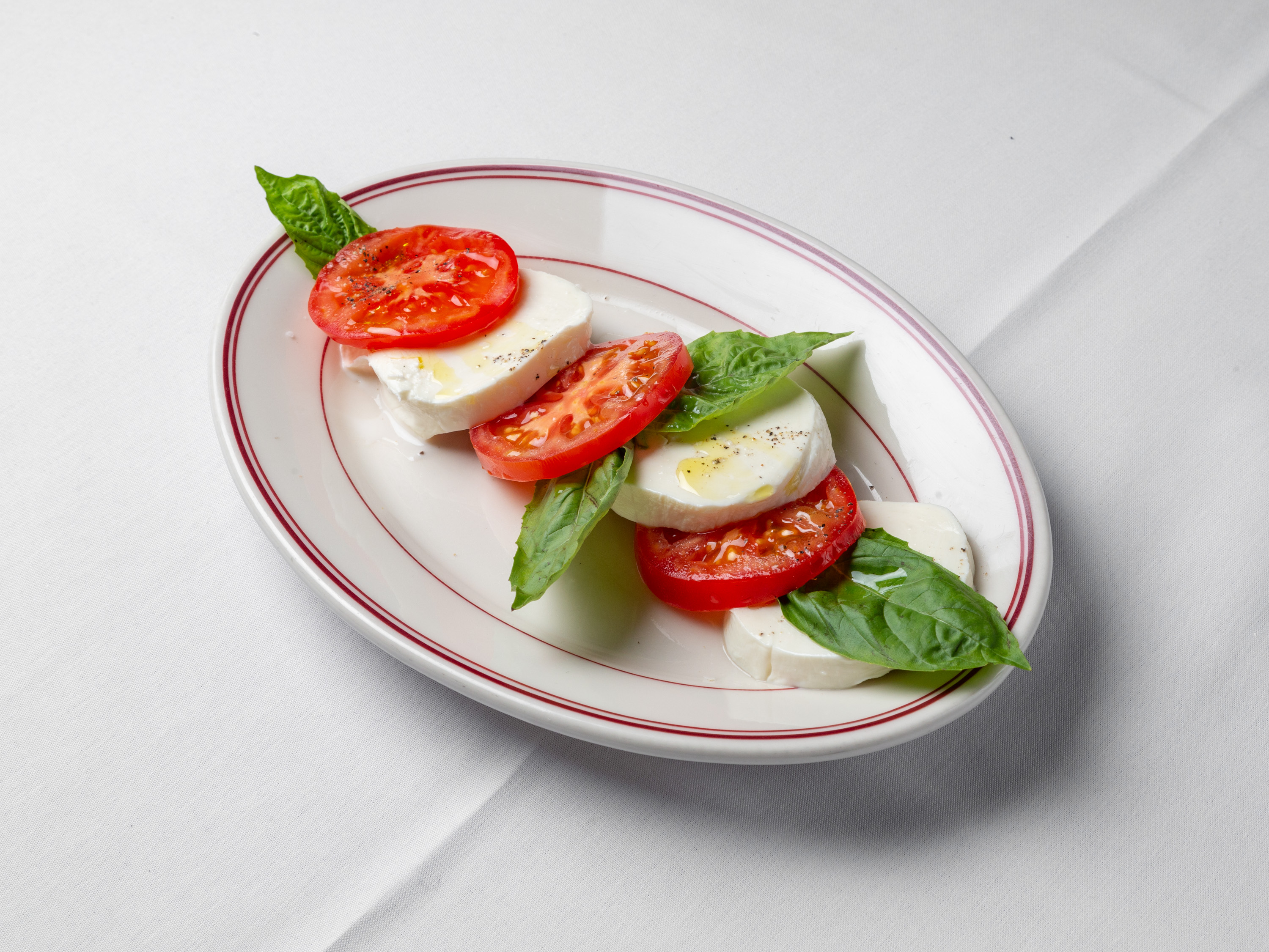 Order Caprese food online from Louie's Italian Restaurant and Bar store, Greenwich on bringmethat.com