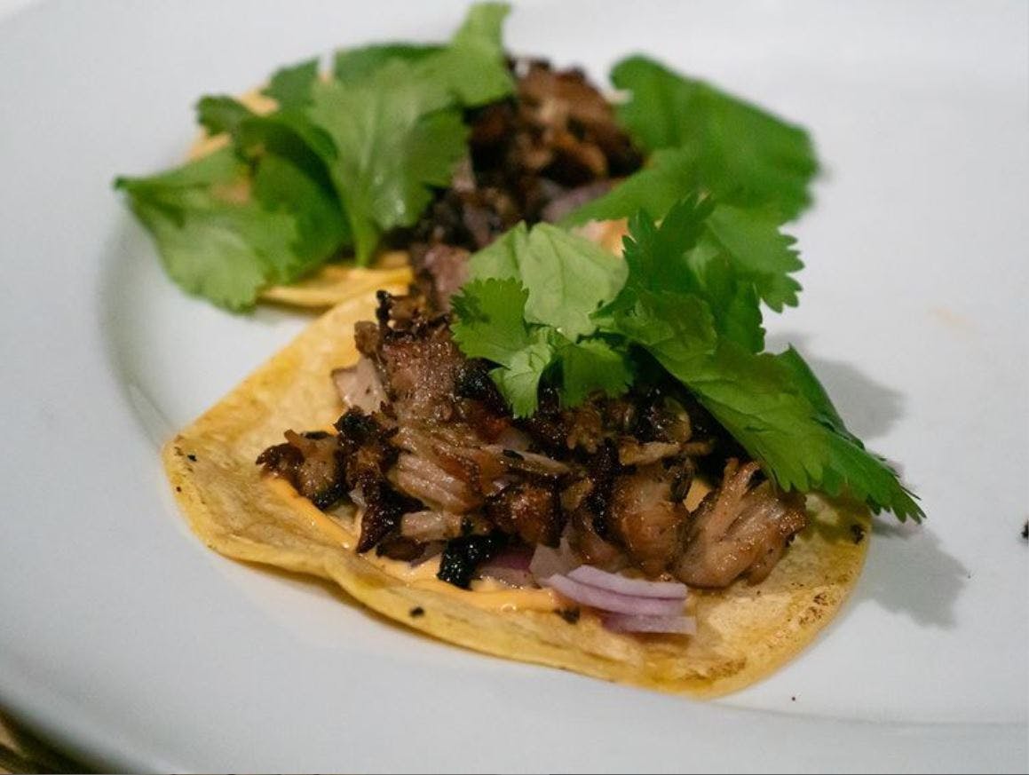 Order Tacos Carnitas - Entree food online from Arturo Boada Cuisine store, Houston on bringmethat.com