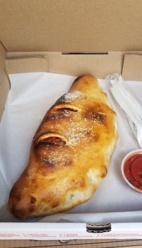 Order Supreme Calzone - Calzone food online from House Of Pizza store, San Antonio on bringmethat.com