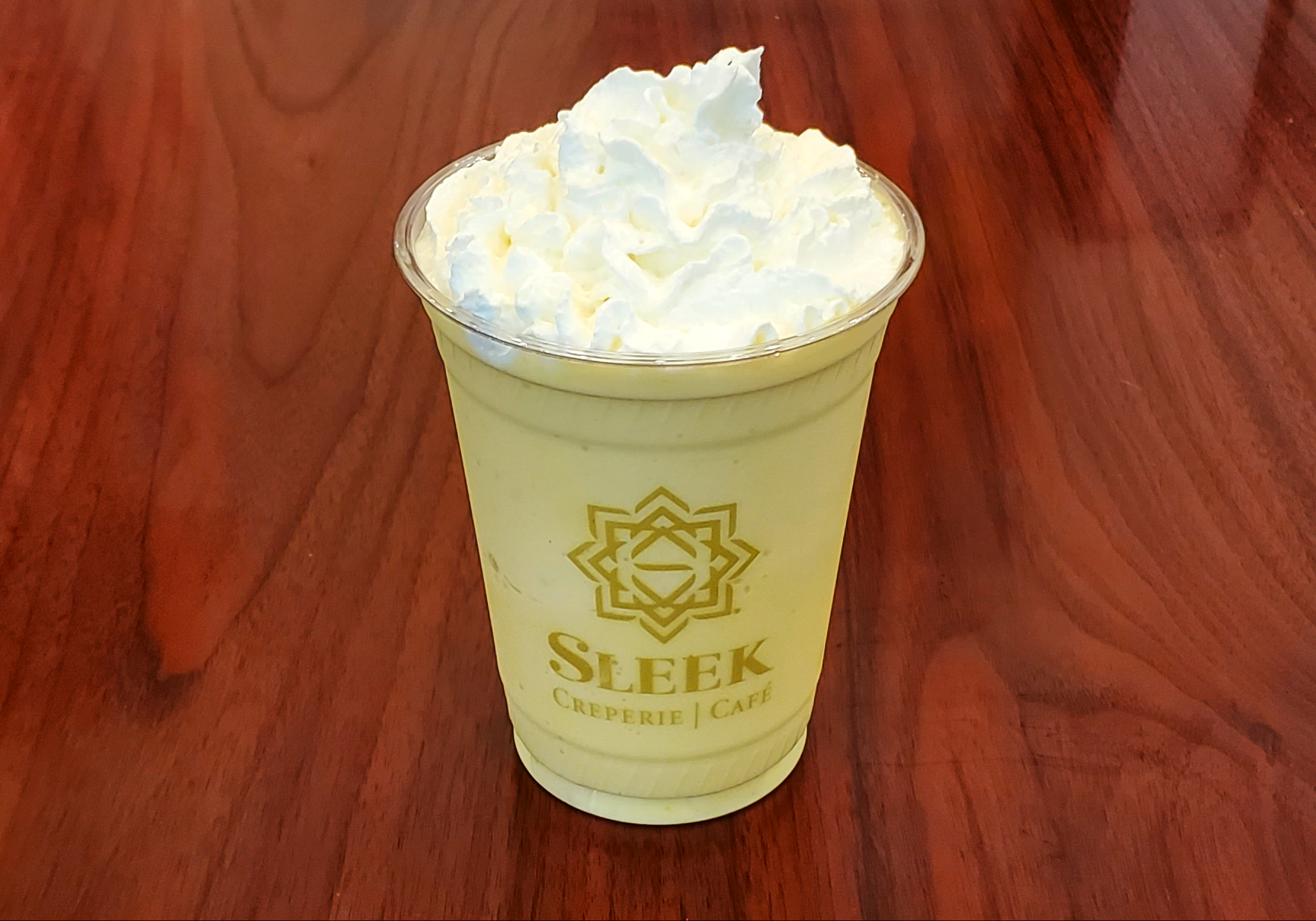 Order Mango Smoothie food online from Sleek Creperie Cafe store, Cypress on bringmethat.com