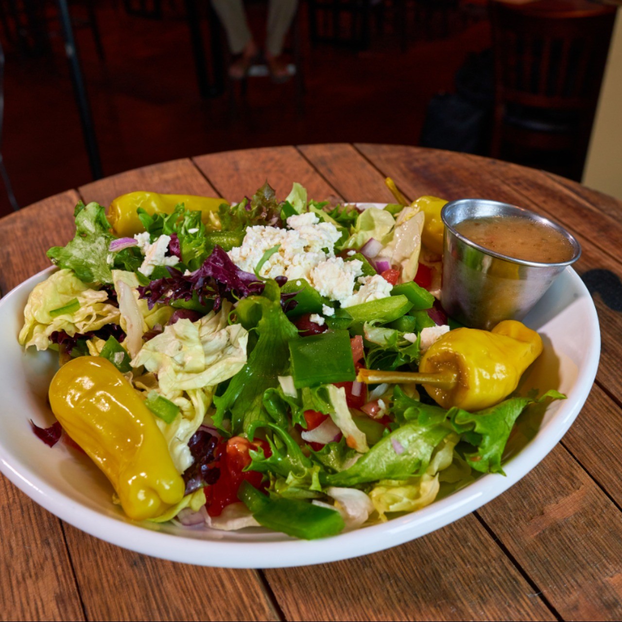 Order Greek Salad food online from Jimmy E Bar + Grill store, Signal Hill on bringmethat.com