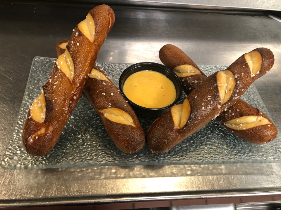 Order Soft Pretzel Sticks with Beer Cheese Sauce food online from The Grapevine Restaurant & Catering store, Buffalo on bringmethat.com