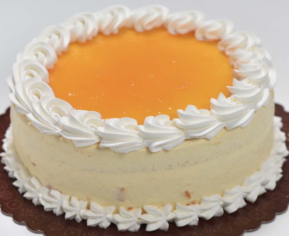 Order Mangolicious Cake - 8" Round  food online from Goldilocks store, Union City on bringmethat.com