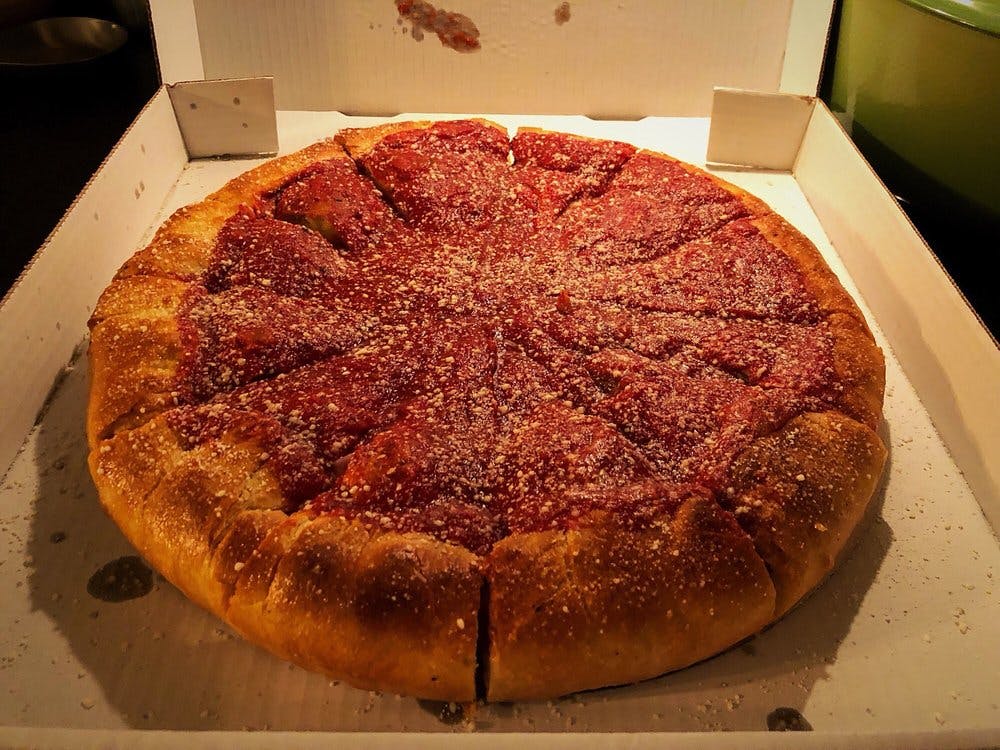 Order Chicago Stuffed Cheese Pizza - Small (6 Pieces) food online from Zino's Subs Pizza & Catering store, Livonia on bringmethat.com