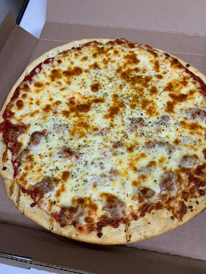 Order Sausage Pizza Slice - Slice food online from Coluta's Pizza store, Chicago on bringmethat.com