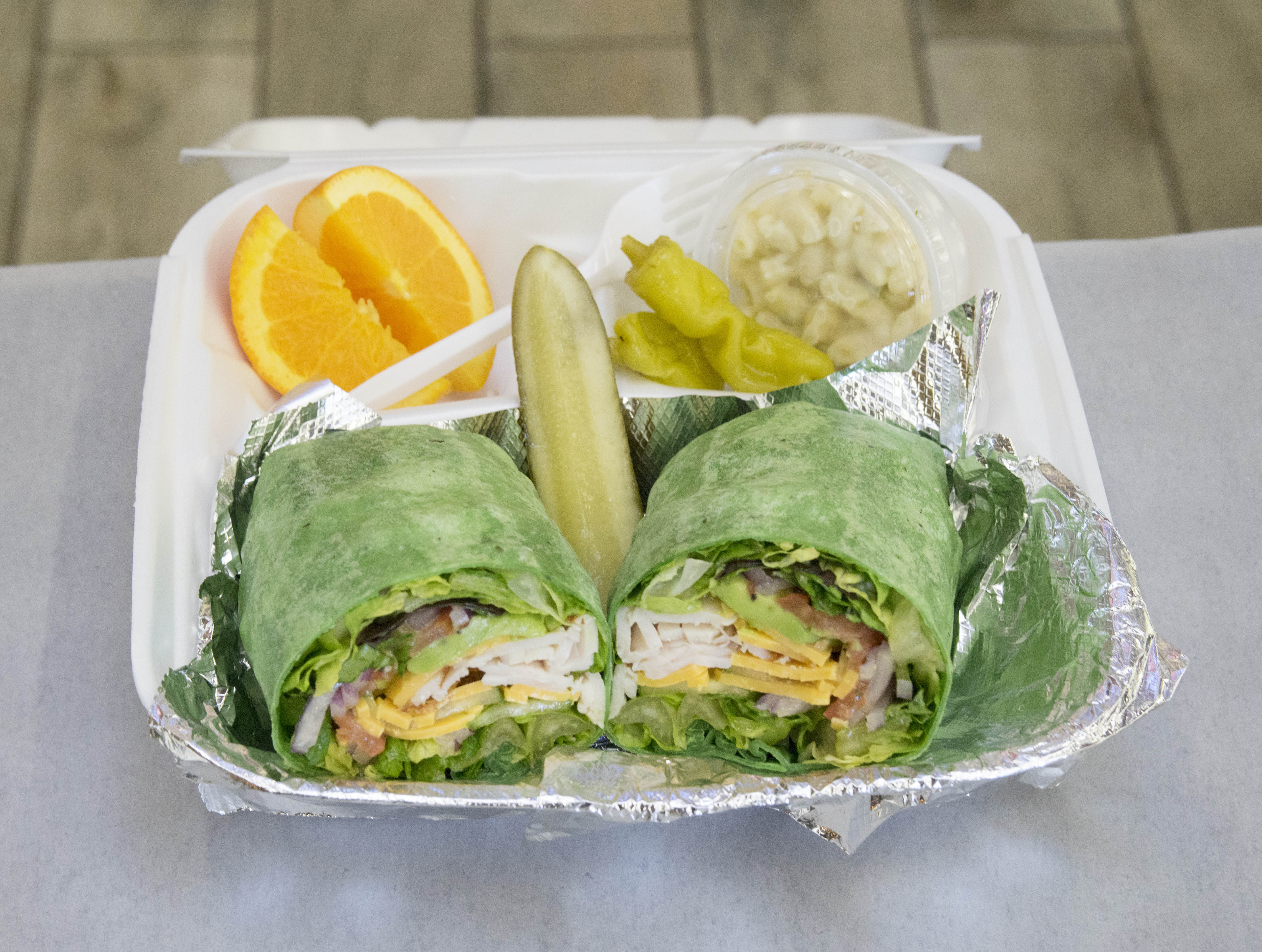 Order Turkey Delight Wrap food online from Knockout Deli store, San Diego on bringmethat.com
