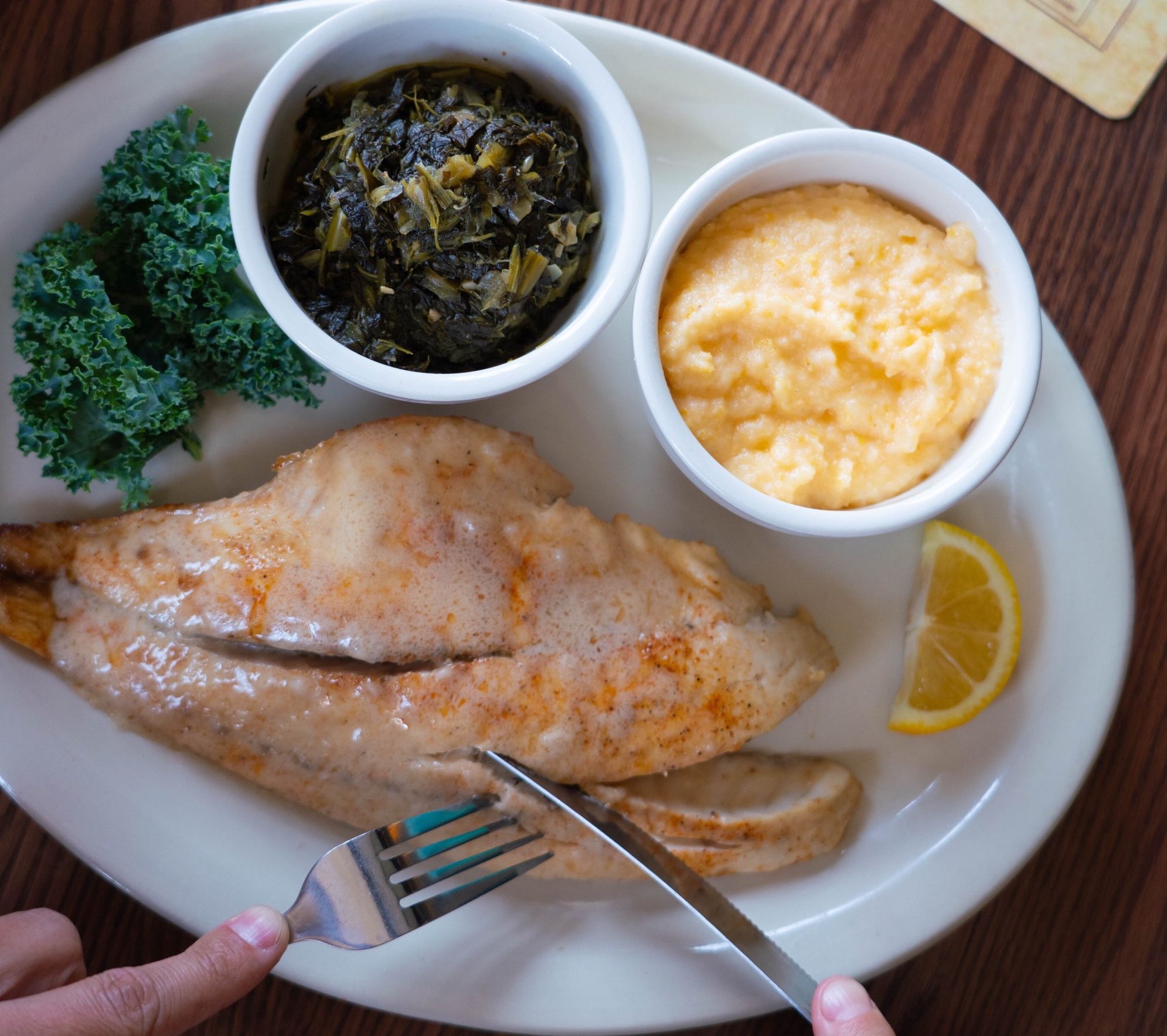 Order Grilled Red Fish Beurre Blanc food online from Mambo store, New Orleans on bringmethat.com