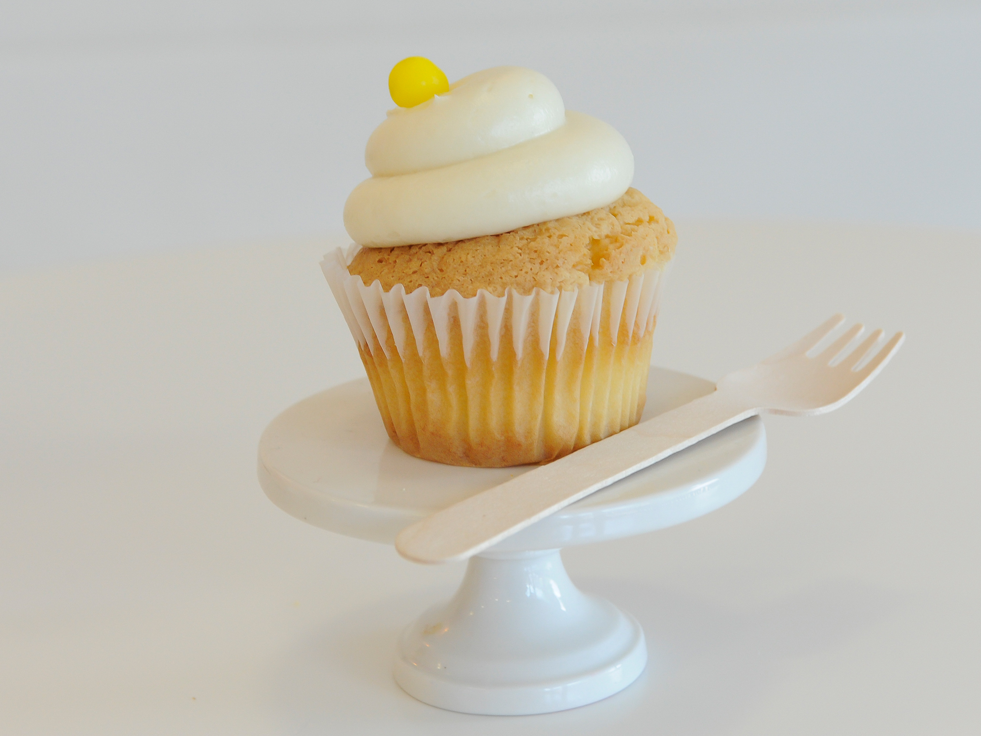 Order Lemon Drop Cupcake food online from Camicakes Creamery store, Smyrna on bringmethat.com