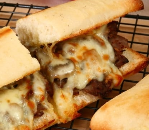 Order Philly Cheese Steak Sandwich food online from Penguino's Pizza store, Buffalo Grove on bringmethat.com