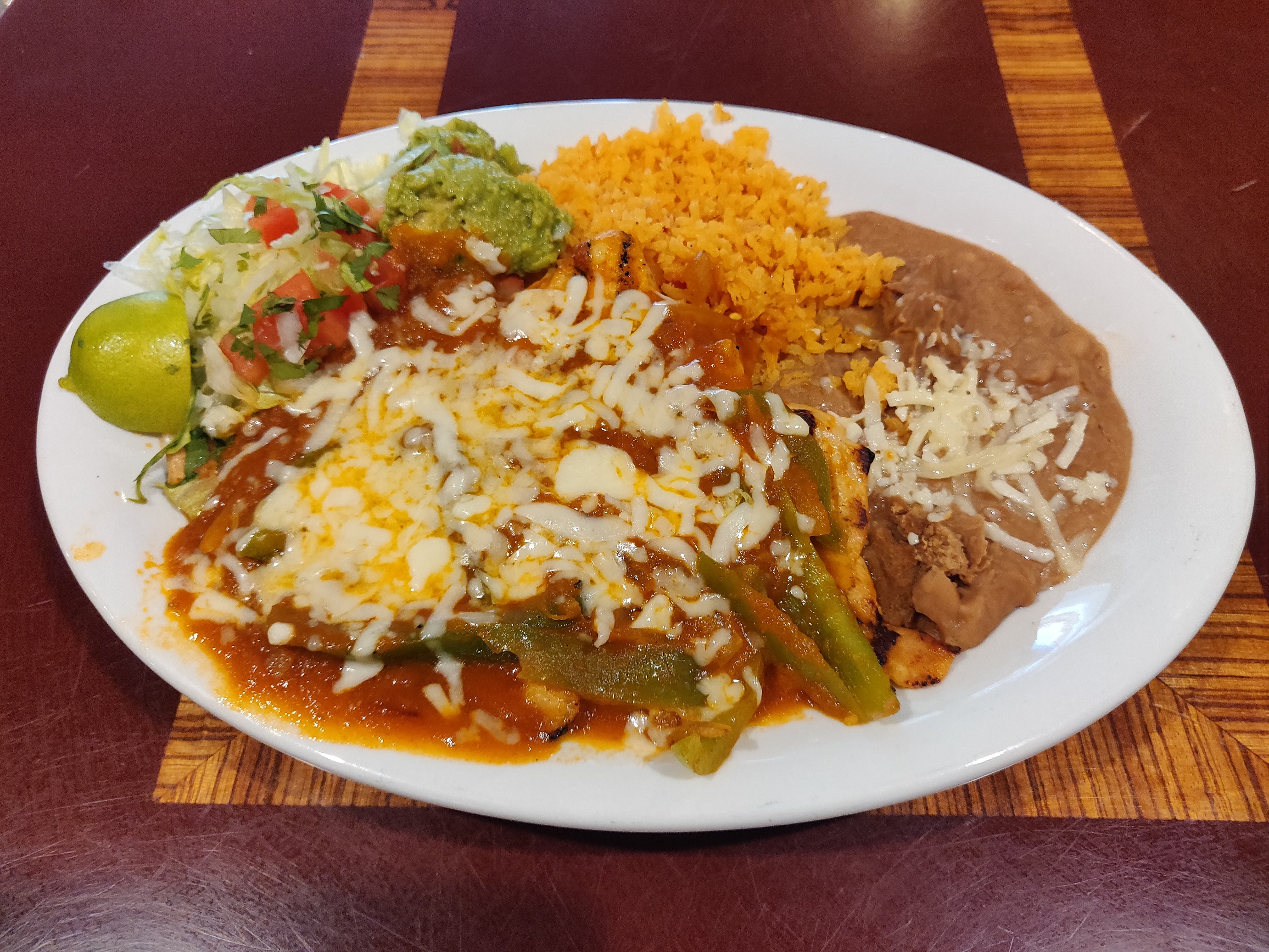 Order Chicken Breast Ranchera Suiza Dinner food online from Taqueria El Ranchito store, Chicago on bringmethat.com