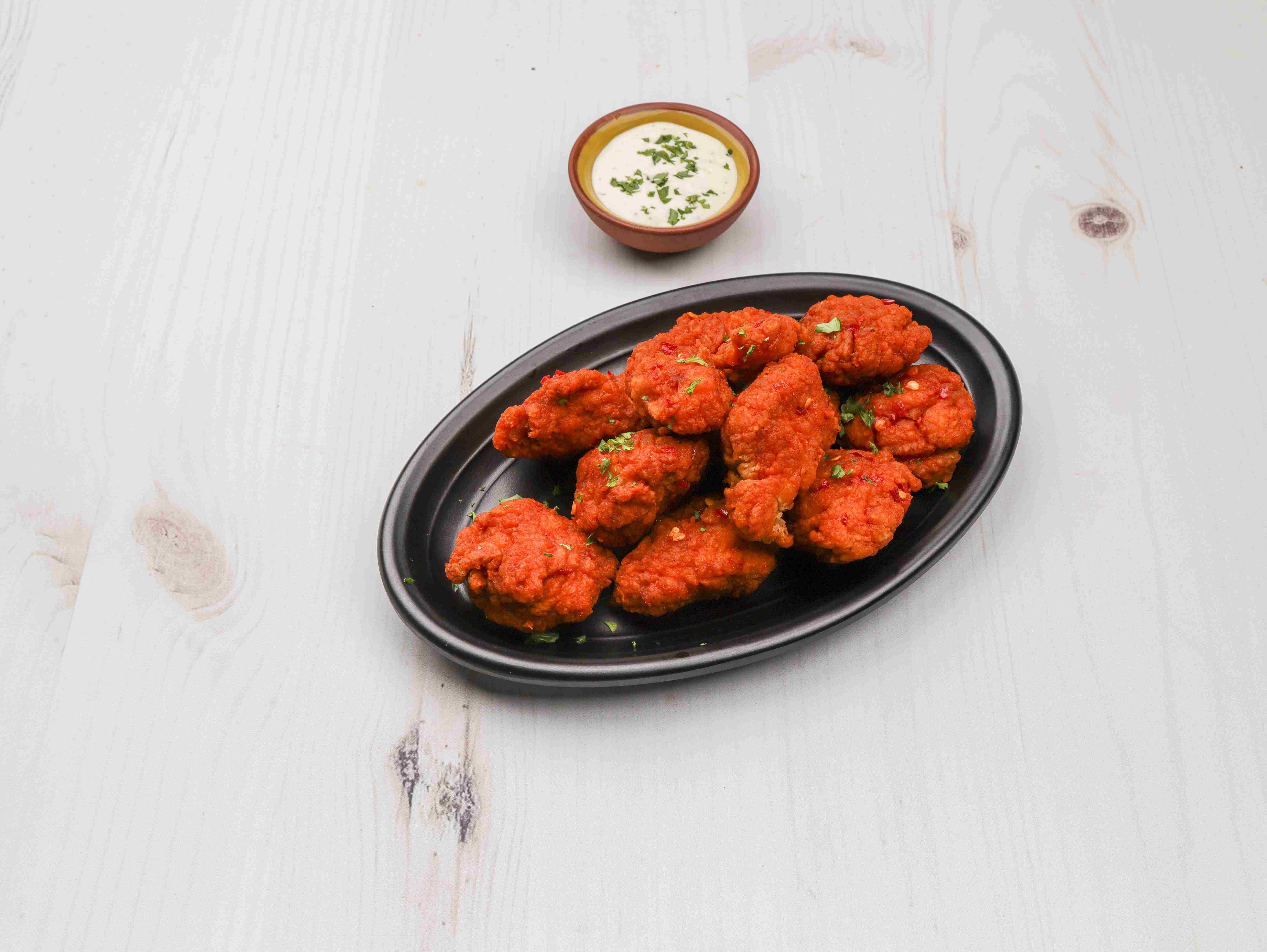Order Airliner's Boneless Buffalo Wings food online from The Airliner store, Iowa City on bringmethat.com