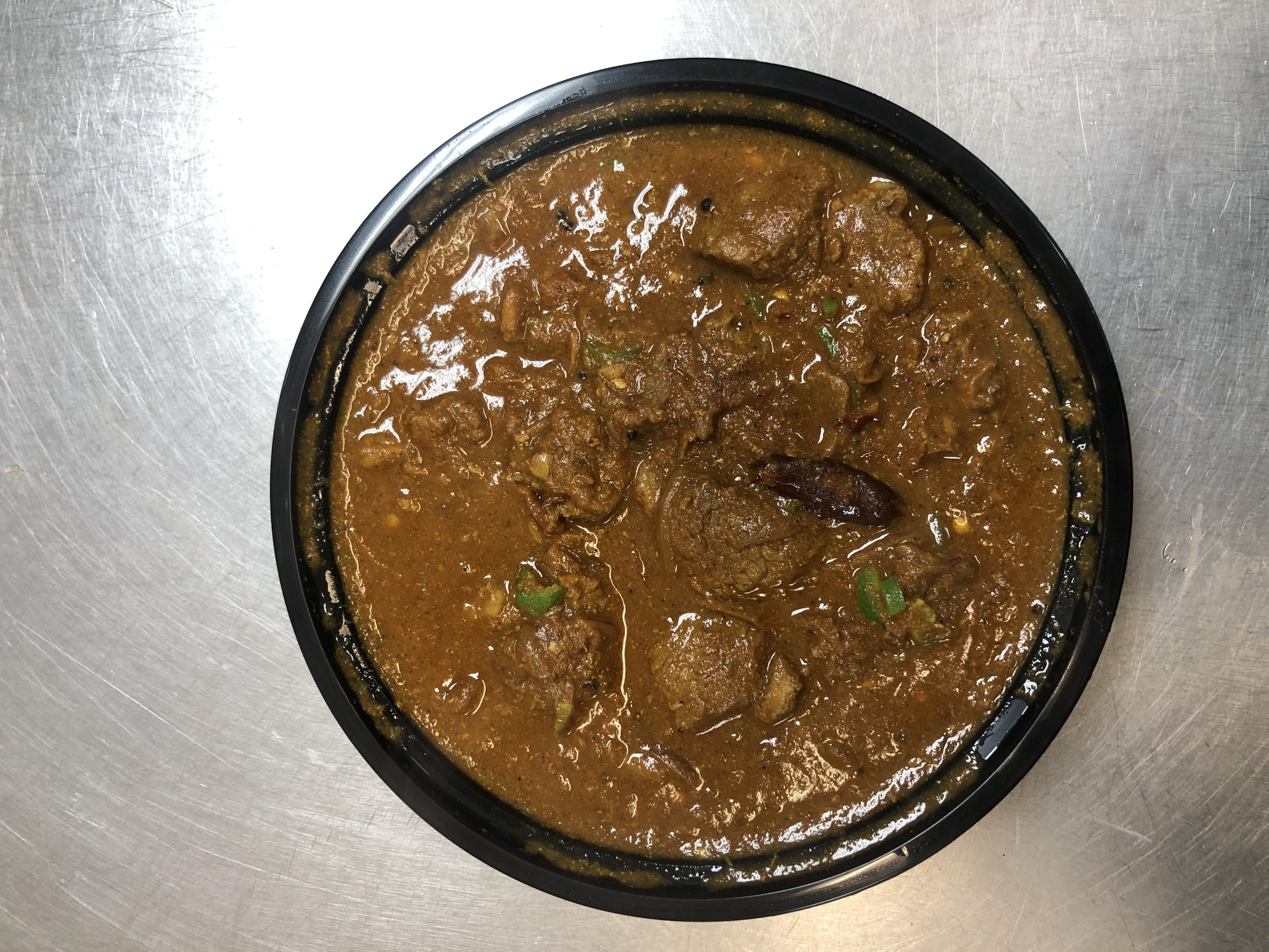 Order Lamb Curry food online from Cafe 47 store, Edmond on bringmethat.com