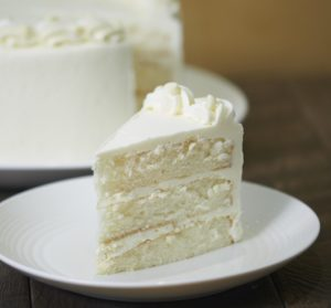 Order White Chocolate Cake food online from Cornerstone Cookie Gifts store, Marietta on bringmethat.com