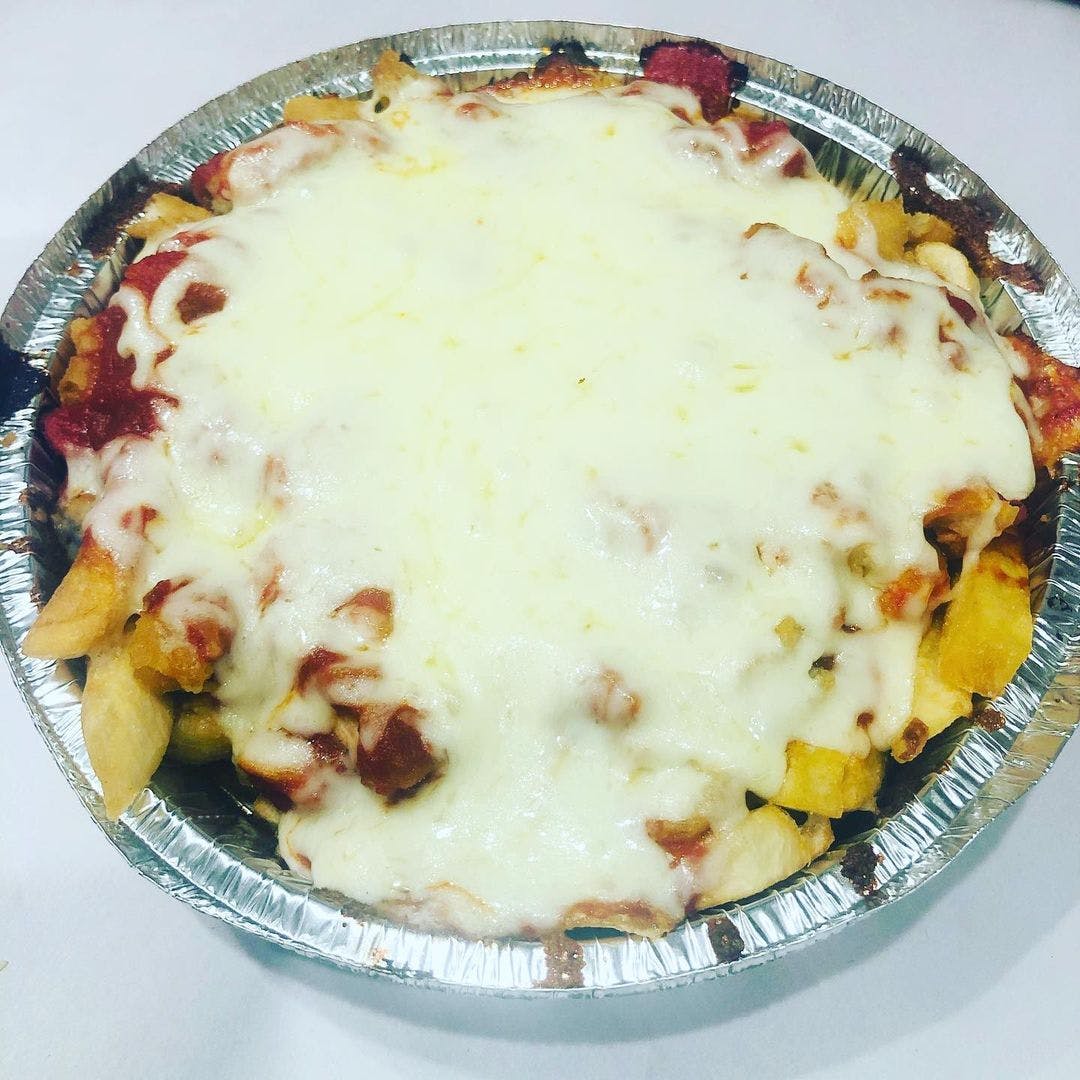 Order Chicken Parm Fries - Appetizer food online from Shef's Pizza & Deli store, Philadelphia on bringmethat.com