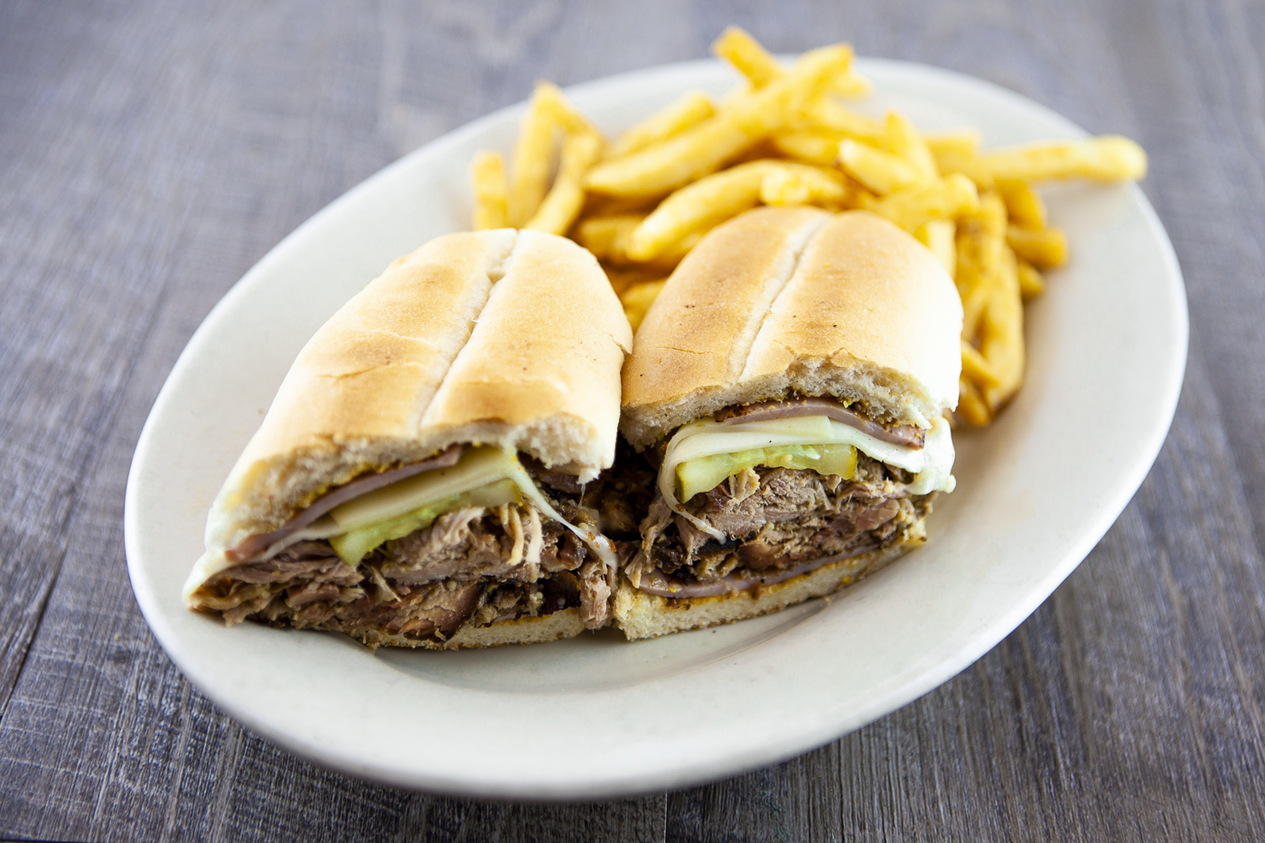 Order The Cuban Sandwich food online from Fitz's store, University City on bringmethat.com