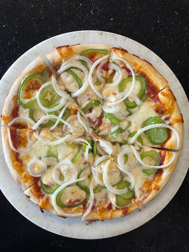 Order Hot Pepper and Onion Pizza food online from Desi Food Galaxy store, Somerset on bringmethat.com