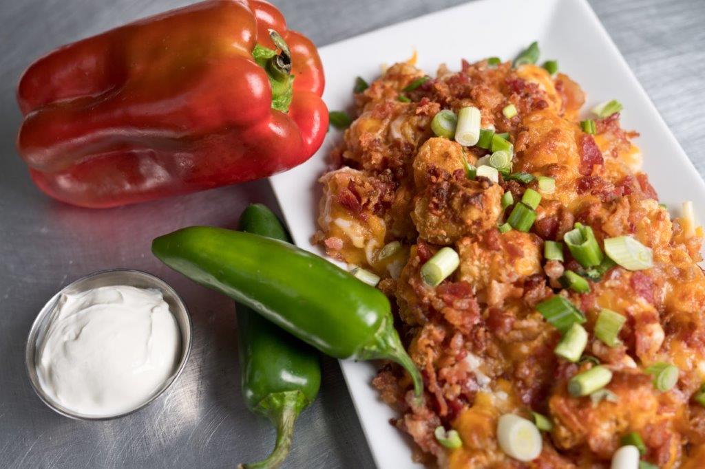 Order Smothered Tater Tots food online from Tipping Chair Tavern store, Milldale on bringmethat.com