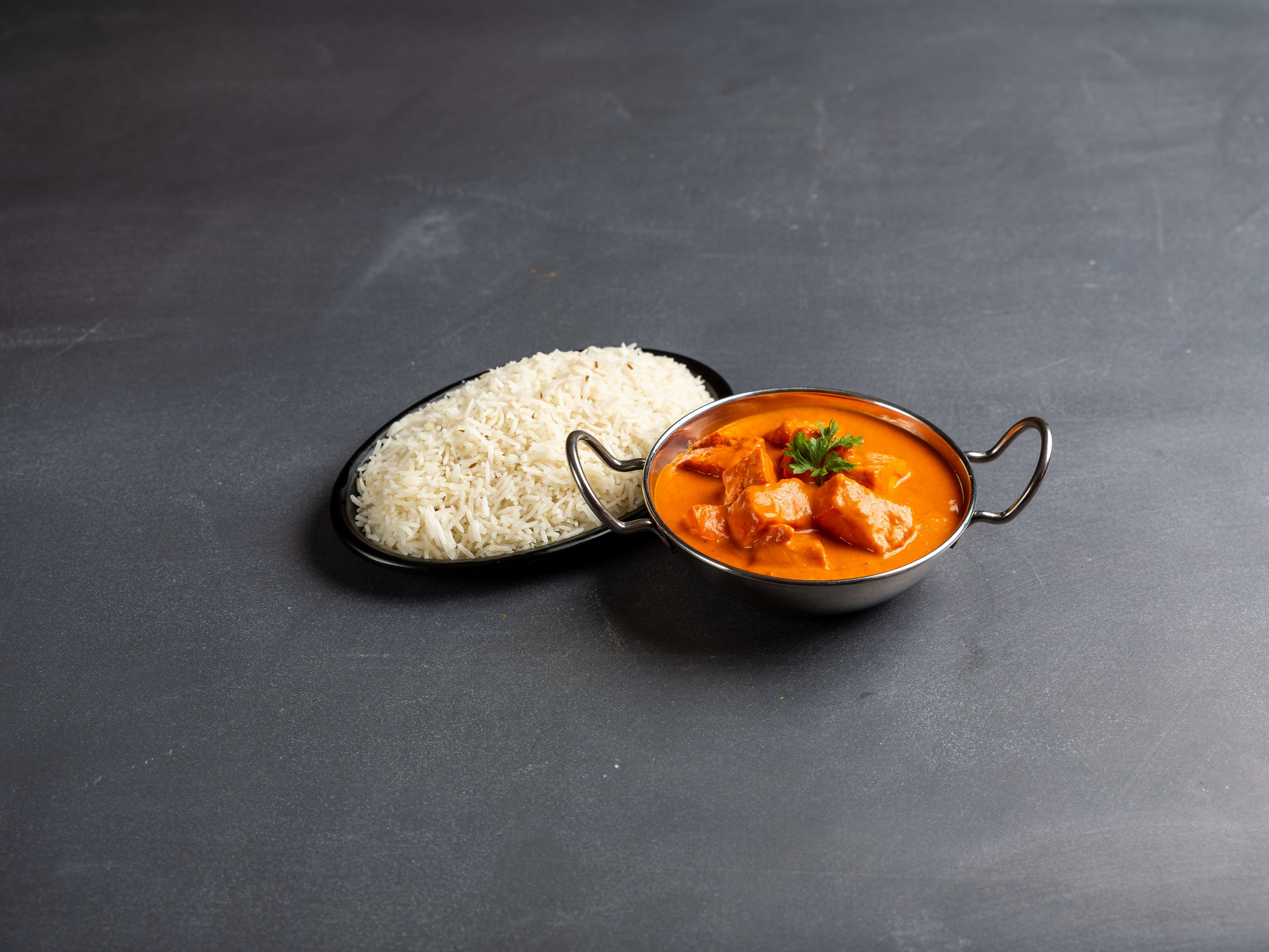 Order Butter chicken  food online from Nawab Indian Cuisine store, Huntington on bringmethat.com