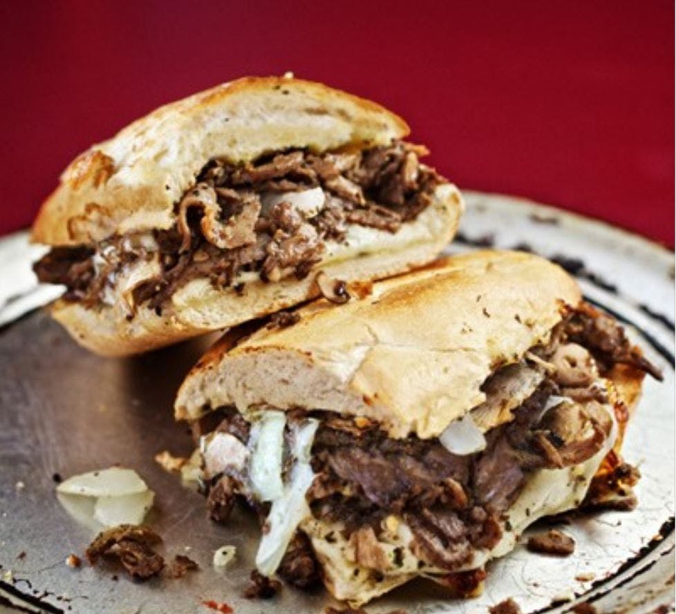 Order Philly Cheesesteak Sandwich - Sandwich food online from Doubledave's Pizzaworks store, Midland on bringmethat.com
