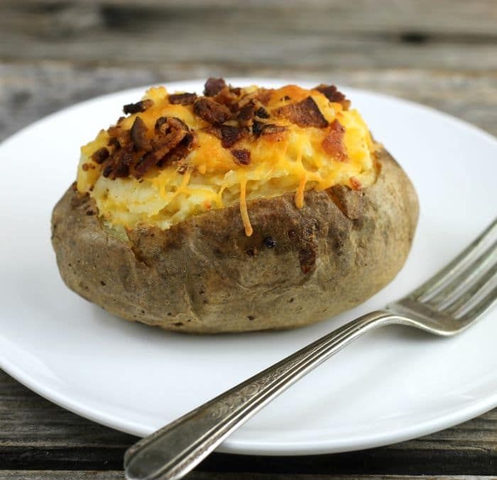 Order LOADED BAKED POTATO food online from Leo Coney Island store, Grand Blanc on bringmethat.com