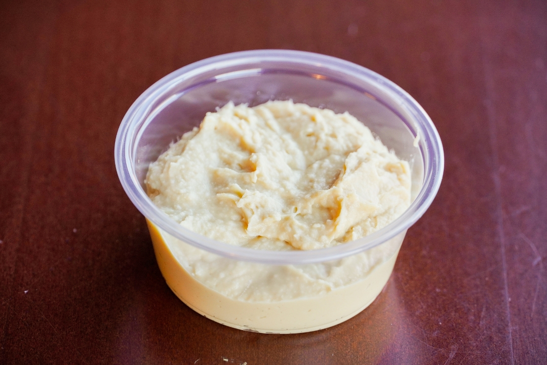 Order Hummus Cup food online from Afro Deli store, Minneapolis on bringmethat.com