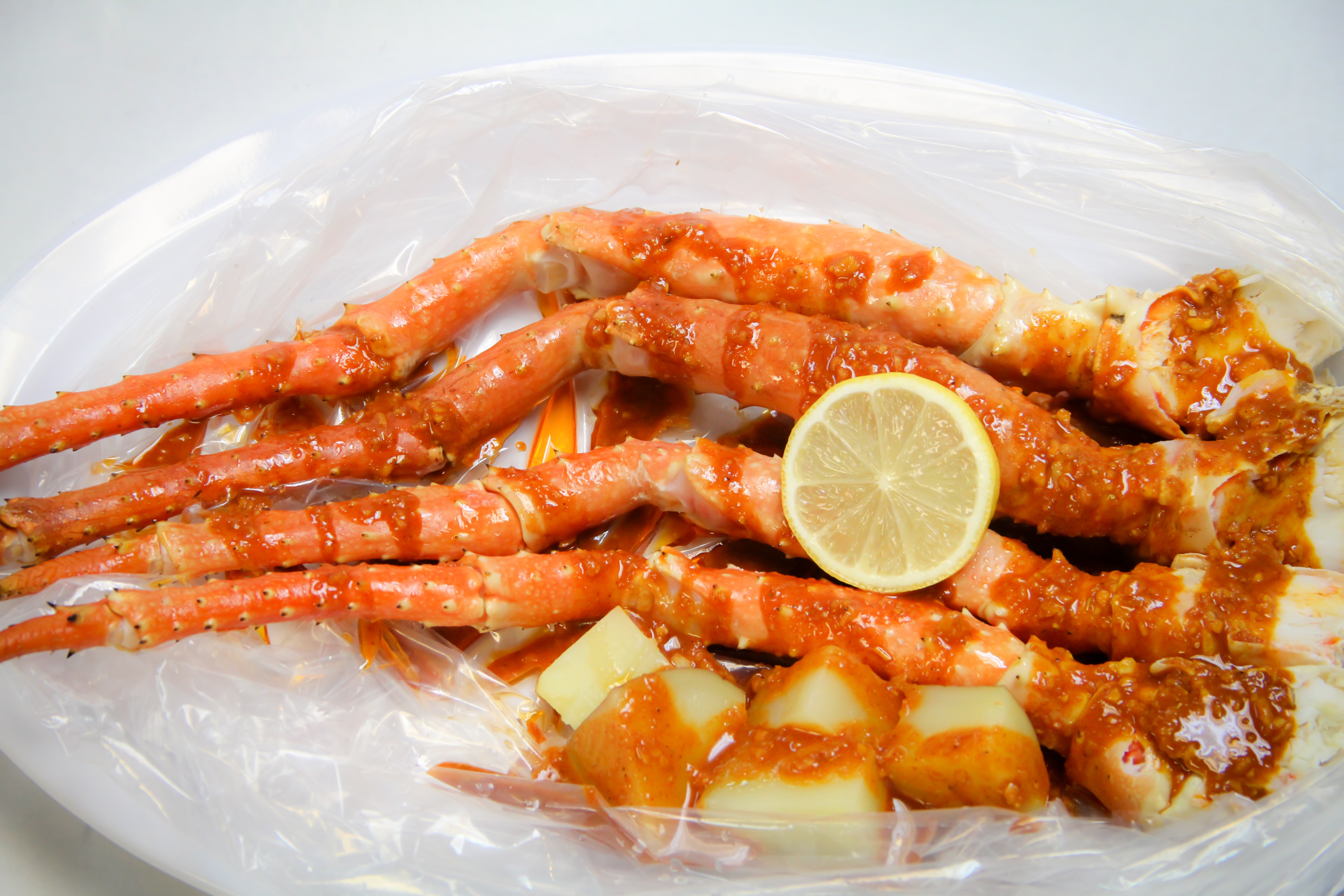 Order King Crab Legs  food online from Nine Seafood Restaurant store, Cerritos on bringmethat.com