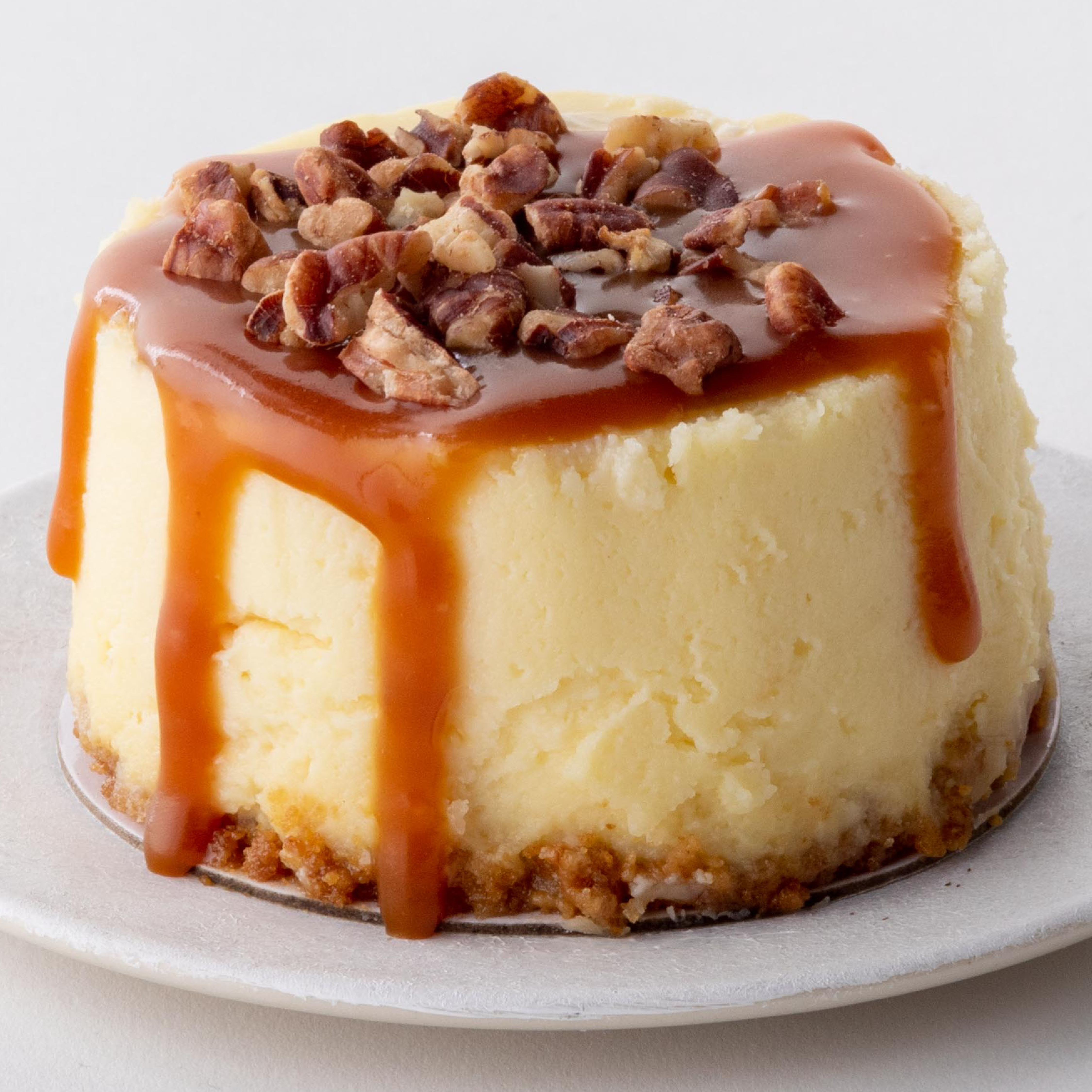 Order Caramel Pecan Cheesecake to go food online from Magnolia Bakery store, Chicago on bringmethat.com