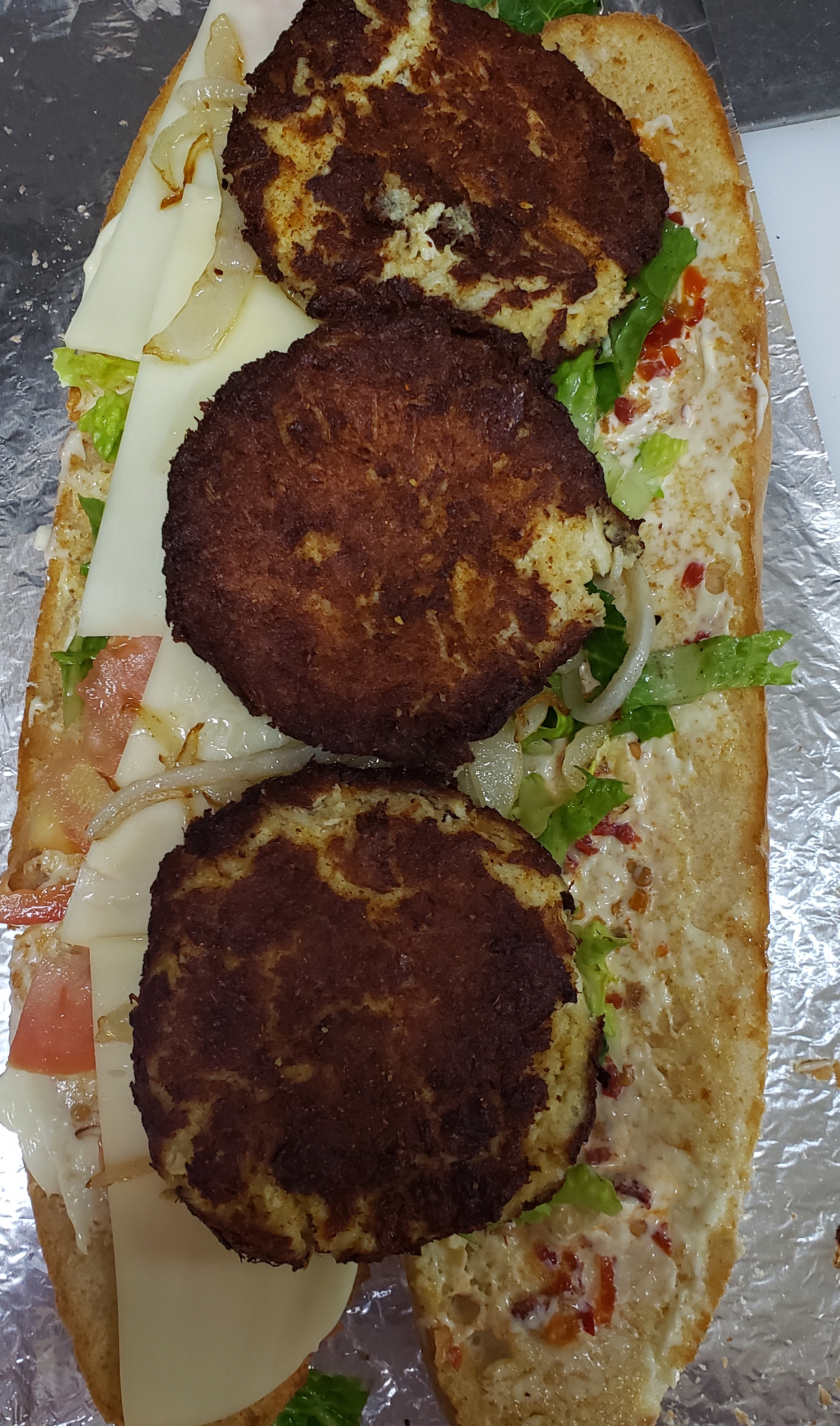 Order Crab Cakes Sub food online from Pizza Mart store, Baltimore on bringmethat.com