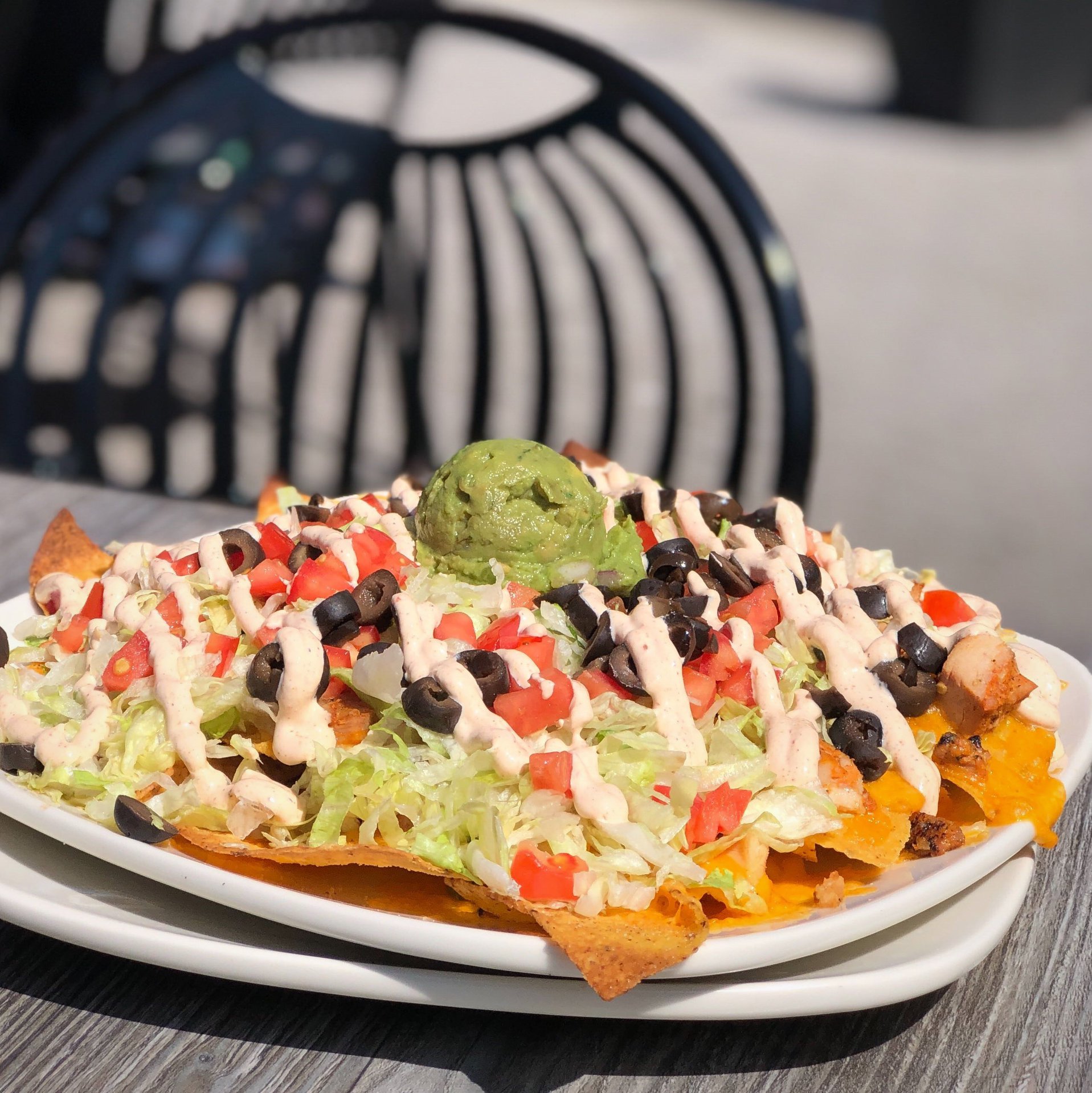 Order Deluxe Nachos food online from Uccello Ristorante store, Rockford on bringmethat.com