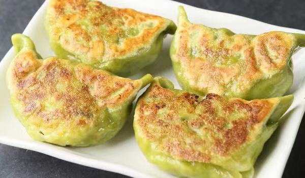 Order Pan Fried Vegetable Potstickers  香煎蔬菜鍋貼 food online from Dim Sum Club store, San Francisco on bringmethat.com