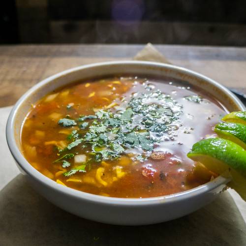Order Chicken Tortilla Soup food online from Roscoe's Smokehouse store, Burleson on bringmethat.com
