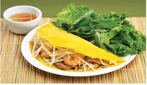 Order 74. Vietnamese Sizzling Crepe - Banh Xeo food online from Saigon Noodles & Grill store, Arlington on bringmethat.com