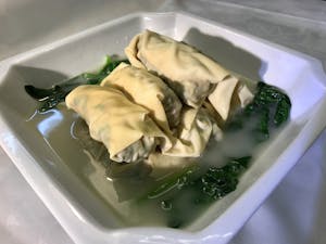 Order B9. Pork Belly in White Sauce 荠菜百叶包 food online from Garage Restaurant store, San Gabriel on bringmethat.com