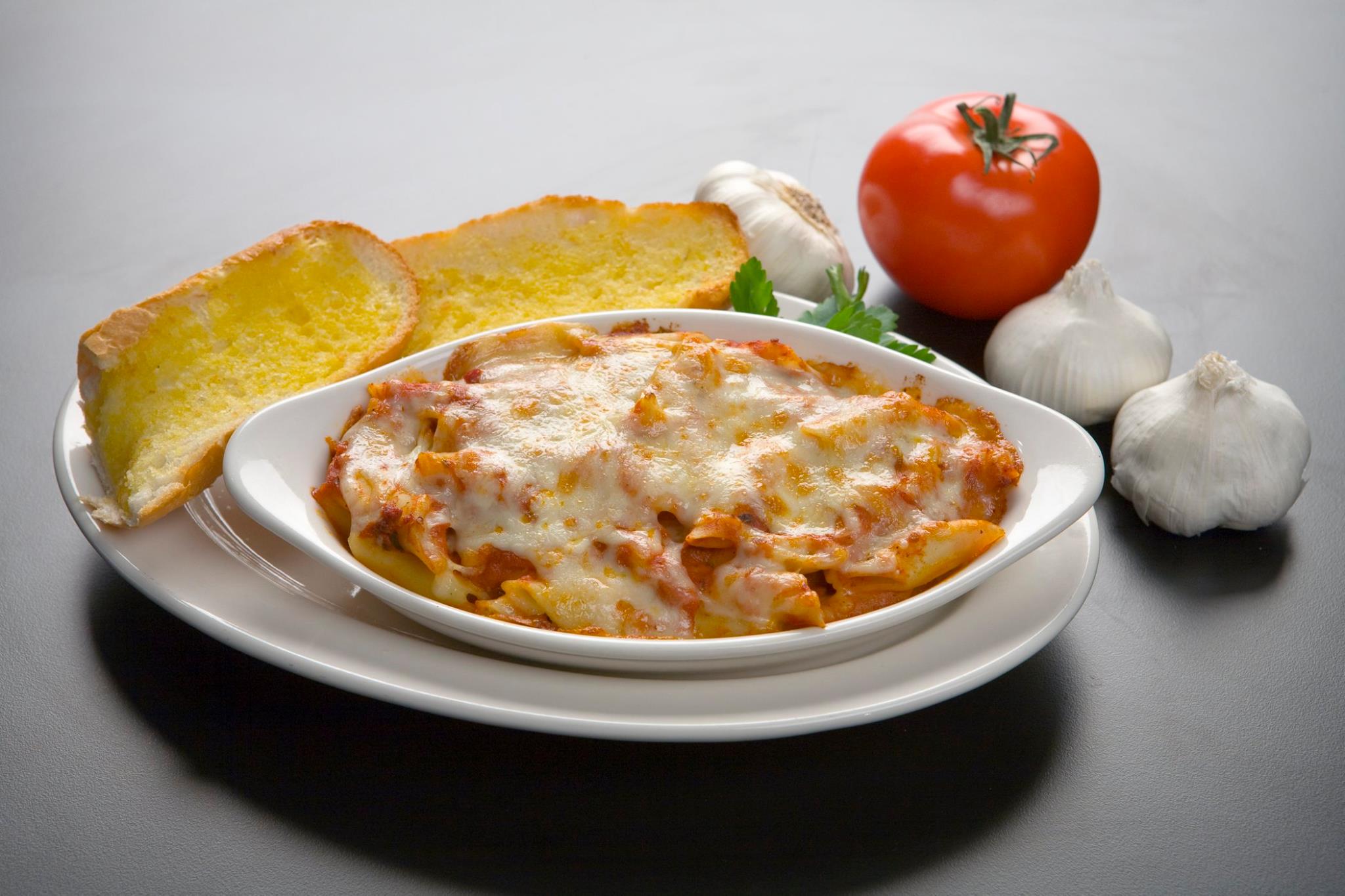 Order Baked Mostaccioli Pasta food online from Imo's Pizza store, St. Louis on bringmethat.com