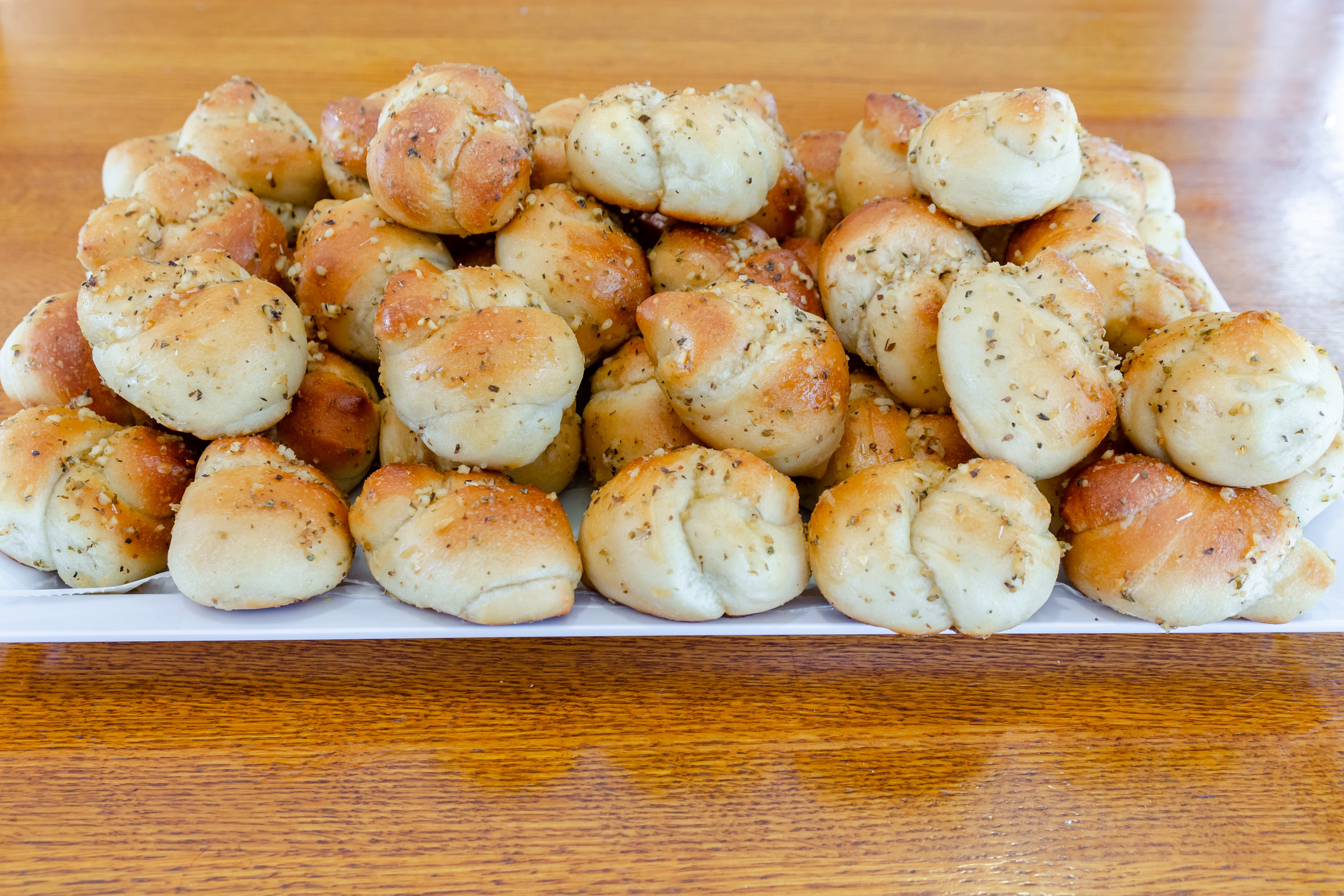 Order Garlic Knots - 5 Pieces food online from Loradella's family pizzeria store, Jersey City on bringmethat.com